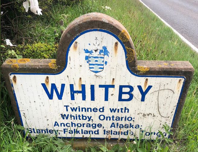 FalklandsinUK's tweet photo. Some #WednesdayWisdom, #Whitby has been twinned with #Stanley for 37 years; both are #Fishing centres and ex #Whaling #ports; both have #Whalebone #Arches & links to #HMSEndeavour, #JamesCooks ship that was used to supply #PortEgmont in the #Falklands after his voyages. #TwinTown https://t.co/ncWdX416to