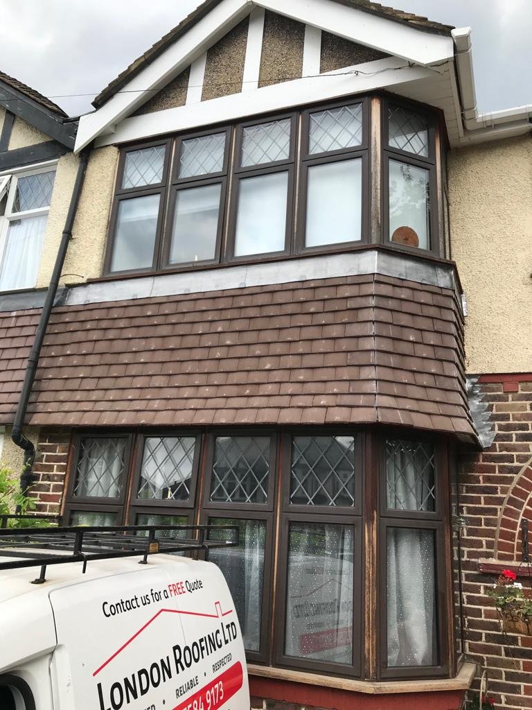 LondonRoofing41's tweet photo. We don't just renew flat roofs, here we renewed the hanging tiles with a new Redland roof tile & installed a new lead cover flashing. The new tiles make a big difference to the aesthetic appeal of this house #londonroofing #roofing #hangingtiles #tilingworks #lead #beforeandafter https://t.co/bIagVERNp9