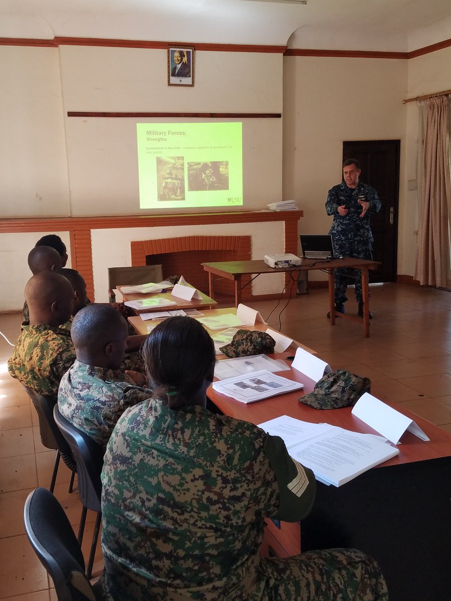 theCGHE's tweet photo. CAPT Jeff O'Dell presents an overview of humanitarian emergencies on the first day of APRRP's International Military Medical Humanitarian Assistance Training with members from the Uganda People's Defence Forces in Jinja. For more on #APRRP: https://t.co/viQsLK5i2b #DoDGHE https://t.co/z5dk4TmEPP