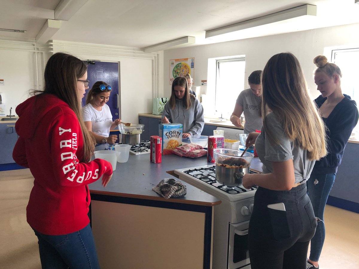 Belmont_School's tweet photo. Fantastic to have one of our ex-students back to demonstrate how to be hygienic and help us to make fridge cakes ready to raise lots of money for Cheesy Waffles at our charity bbq! #projectweek19 https://t.co/udaERfT6iu