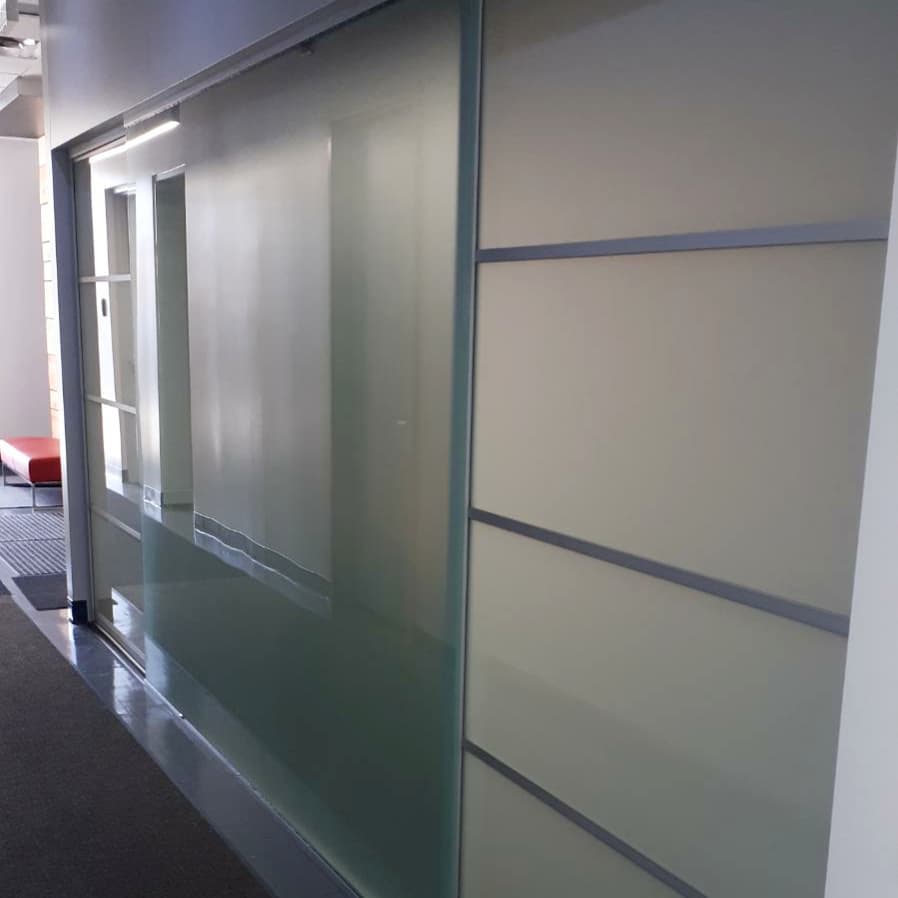 spacesolutions's tweet image. Room dividers: excellent for offices, condos and any space! We installed a pair of sliding panels behind an existing glass wall, completing a modern boardroom space. White lami glass allows light while maintaining privacy. #SlidingDoors #RoomDivider instagram.com/p/B0BWtcMnNtb/