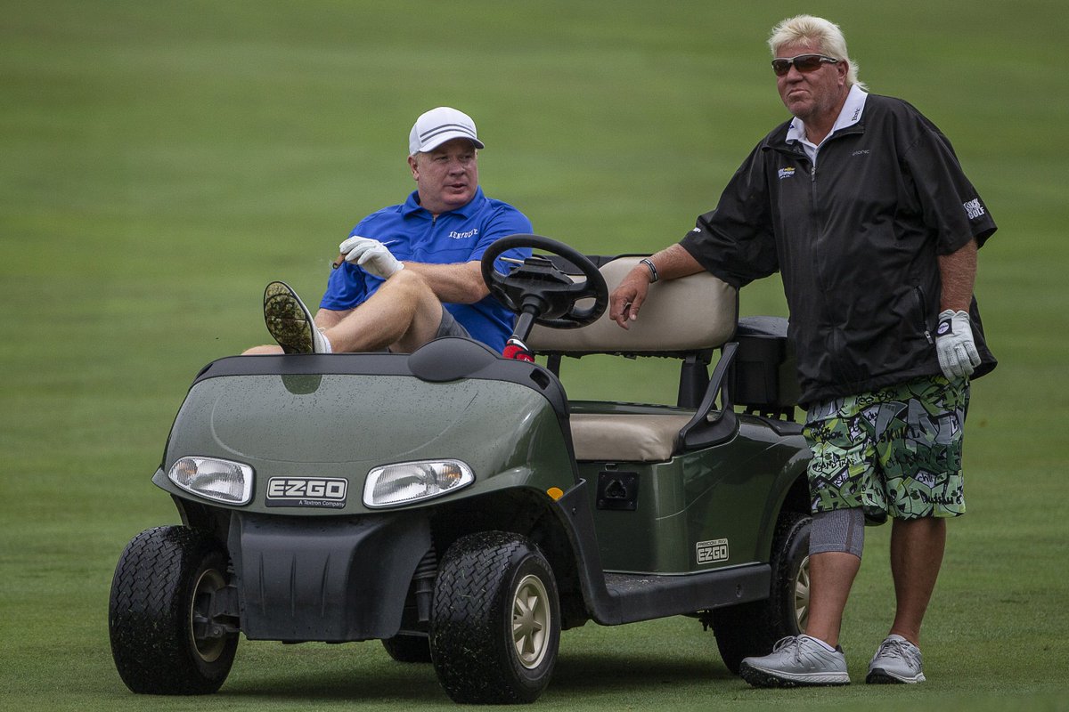 ryanhermens's tweet photo. UK football coach Mark Stoops and John Daly during the pro-am. https://t.co/qq5unanxmE