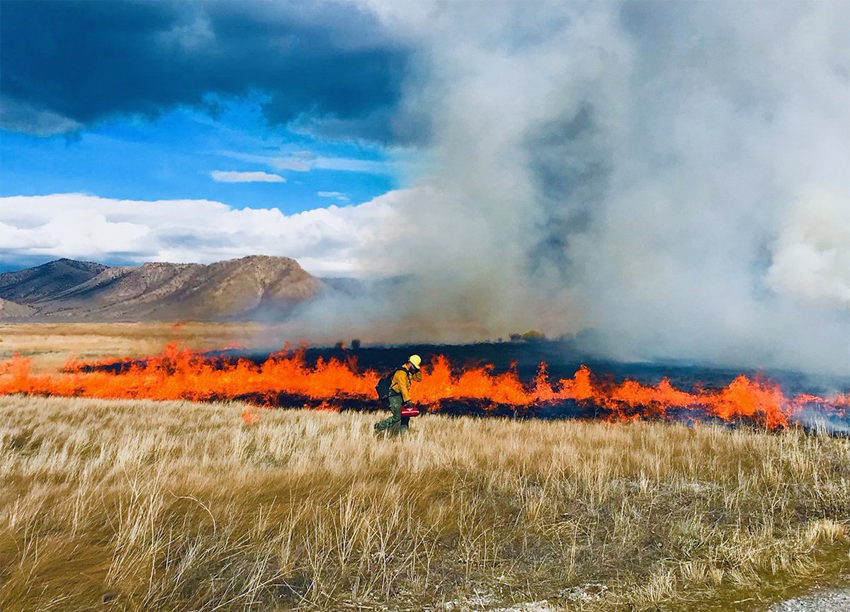 firefighter with blow torch