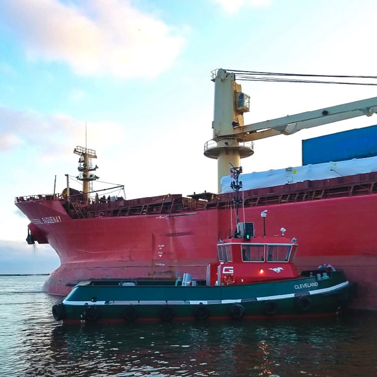 GreatLakesGroup's tweet photo. TWO years ago today, the tug CLEVELAND completed her first tow, assisting @federalnav's M/V FEDERAL SAGUENAY at the @PortofCleveland. CLEVELAND was the first tugboat to be built to meet the new @USCG #SubchapterM Regulations. #fednav #portofcleveland #subm #uscg #tugboatdaily https://t.co/X8YPAMLHls