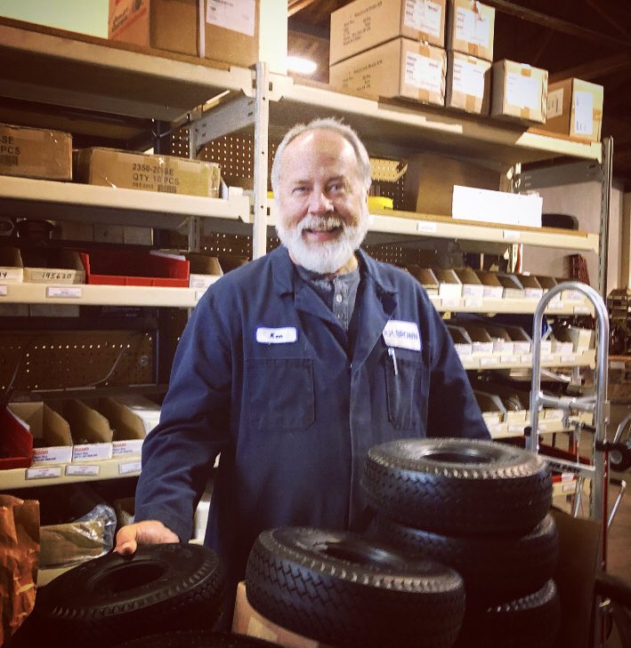 rhbrownco's tweet photo. It’s #warehousewednesday and Ken (often mistook as “Mr. R.H. Brown”) is holding court over some #flatfree #tires. Need a light-weight tire with some bounce? Try flat-free or ask a member of team to help you select tires the best tires for your  jobs. https://t.co/5pWXmzU869
