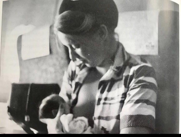 Found in the book “Cabine”. A KLM flight attendant in uniform putting a baby to breast. <a href="/KLM/">KLM</a> this was 44yrs ago! Why are you going backwards?! I expect more from a progressive Dutch company! #breastfeeding #KLM