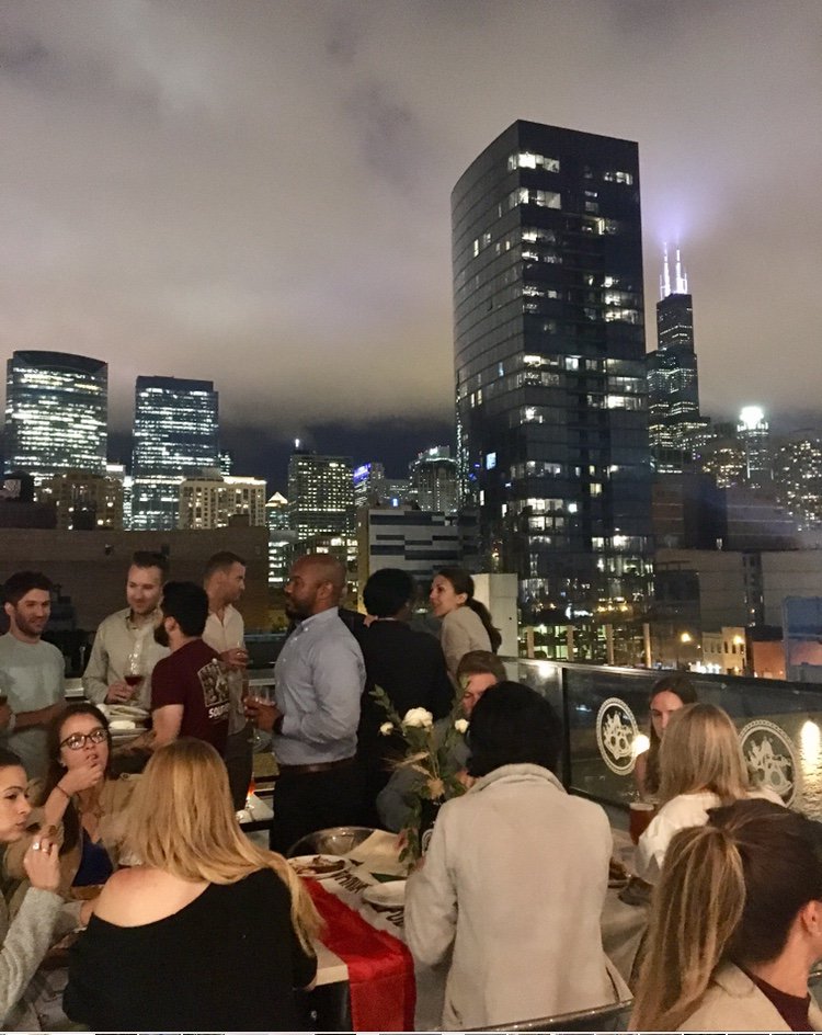 A4: Eating on the rooftop of Ballast Point brewery in the West Loop in Chicago at my brother's going away party! Beautiful city skyline views. #Foodtravelchat #alfrescomeals
