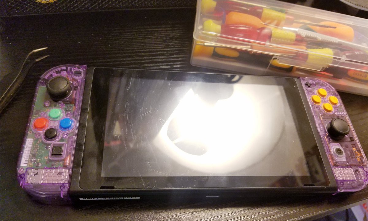 Here is a little project that I've been working on when I have time, and also funds. Bought a broken Switch console and custom shells for my grey joycons. Got the switch working and the shells looking pretty dope. Bought some buttons too for even more 64 controller vibes #switch