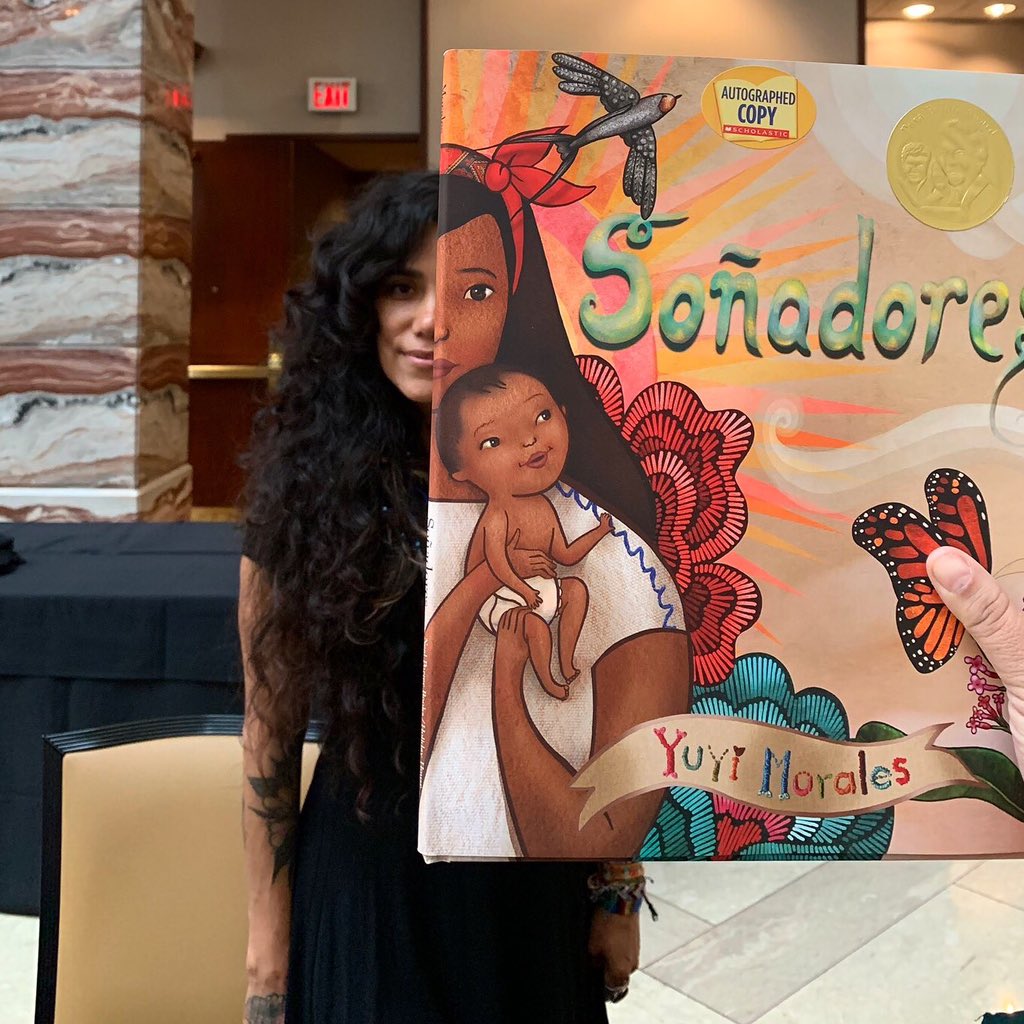 Yuyi Morales (@yuyimorales) on Twitter photo Lorenza Garay, librarian <a href="/RGELibrary/">RGE Library</a> in Houston, didn’t want just a picture of me to show her students, but took THIS picture instead. #bookface Lorenza Garay, librarian <a href="/RGELibrary/">RGE Library</a> in Houston, didn’t want just a picture of me to show her students, but took THIS picture instead. #bookface