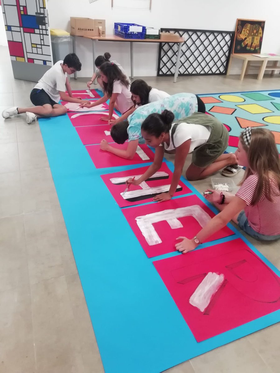 ASBEnglish's tweet photo. Students are busy preparing a banner in Art class that will be hung on stage for our final assembly this Friday. The theme of the performance is "We Go Together," with drama, dance and choral performances based on the musical Grease by primary and secondary afternoon teams. https://t.co/i6m5xDuInz