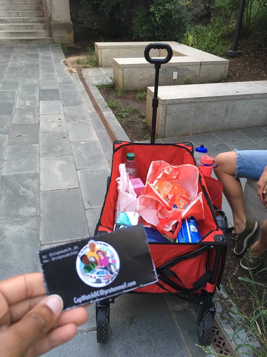 copwatch_dc's tweet photo. #TBT to last week’s Columbia Heights cop watch, during which we did some outreach. We provided some mutual aid thru hygiene kits and palm cards w/ Know Your Rights/Alternatives to Calling the Police info #CopWatchDC #CommunityOverCops #HollaIfUSeeUsAndOurLilRedWagon https://t.co/vkAgm3nNkG