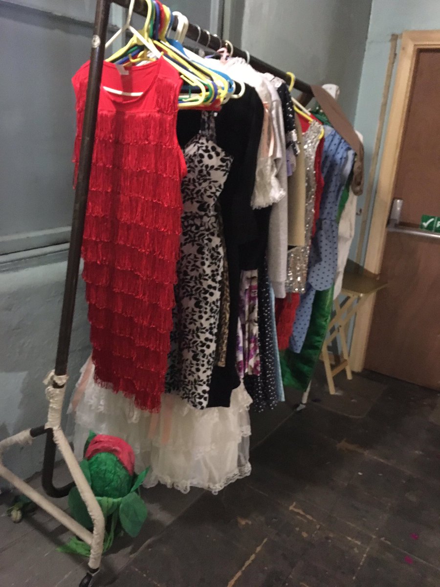 Dentondeviants's tweet photo. While we’ve been rehearsing for tomorrow’s show, Audrey II has been keeping watch over our costumes. Who’s coming to see us this weekend? #glasgow #lsh #littleshopofhorrors #shadowcast #shadowcasting #costumes https://t.co/f3atRxtGX4
