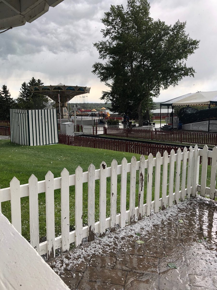 Thank goodness for the #Carousel at ⁦<a href="/HeritageParkYYC/">Heritage Park</a>⁩ so we had a place to weather out the hail!!