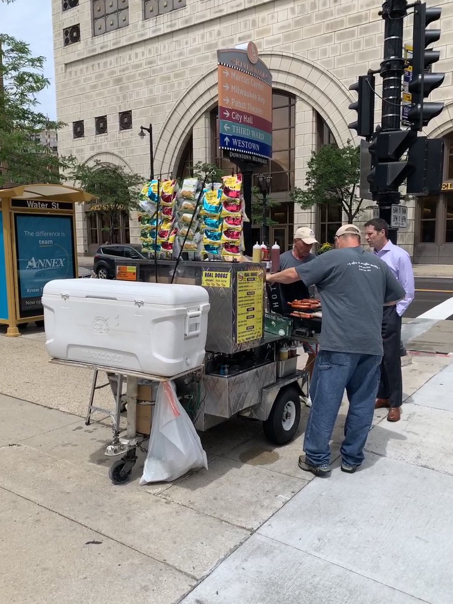 Downtown Milwaukee enjoying a true bratwurst from Rick at Real Doggs w/ @johnmuraski @Patton_UWO during lunch time from the @SAPNextGen #UniversityAlliances Boot Camps. Thanks you guys!! It was great!