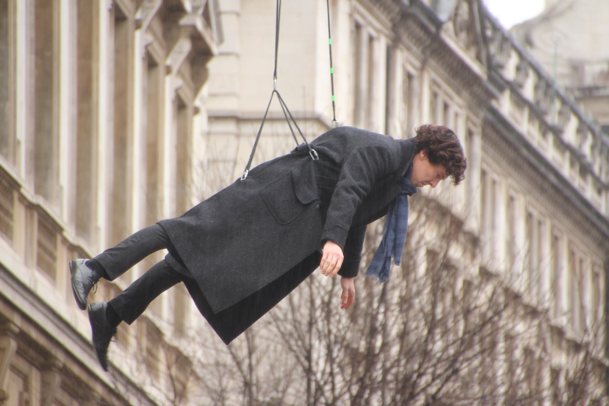 Ive just found a ton of Sherlock filming pics I took in 2013 so in honour of his birthday please enjoy this picture of a grumpy Benedict hanging on a wire