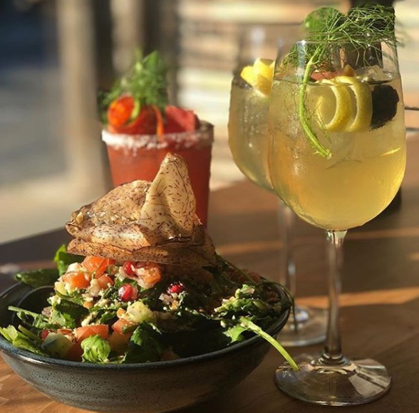 Beat this heat with our refreshing Cocktails on special tonight (and every Thursday)! Tonight’s features are Cucumber Basil Smash 🥒(Dupont) and Basil Vodka Lemonade 🍋 (Roncy). Try it with our new Kabbouleh Salad offered at both locations 😎 📸 @sumaiya.recs  #definanights
