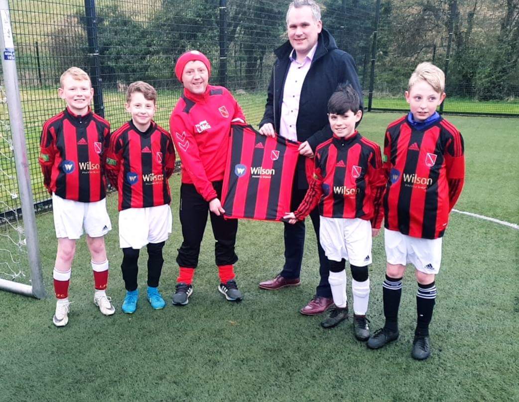 wilsoninsbroker's tweet photo. Our Managing Director, Shane Wilson, presenting a new set of jerseys to @RoversOfficial Football Club U12 team who are competing in this years O'Neills Foyle Cup. We wish Liam McGovern, his management team and players every success #teamrovers #supportlocal #supportouryouth https://t.co/xk8PF9MmaZ