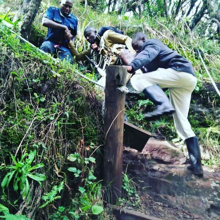KWSKenya's tweet photo. Join us in honoring our @kwskenya selfless ranger Mr. Philip Wesa who went out of his way and hoisted a student from Joyland special school -Kisumu on his back to catch a glimpse of the magnificent Chania falls. https://t.co/oIdGAnNrIO