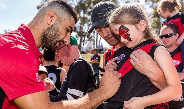 essendonfc's tweet photo. Head to The Hangar this Sunday for an open training session ahead of our #ANZACDay clash.

Read » https://t.co/1ciZ3fkLD6

#DonTheSash https://t.co/2MQ8MkP0Ih