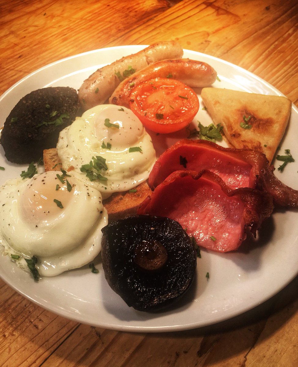Sunday morning’s #bigbullbreakfast - Hannan's bacon, sausage, black pudding, flatcap mushroom, slow roasted tomato, fried egg, potato bread, toasted sourdough #sundaymorning #sundaybreakfast #sundaytreat #sundaytrip <a href="/MeatPeter/">Peter Hannan</a>