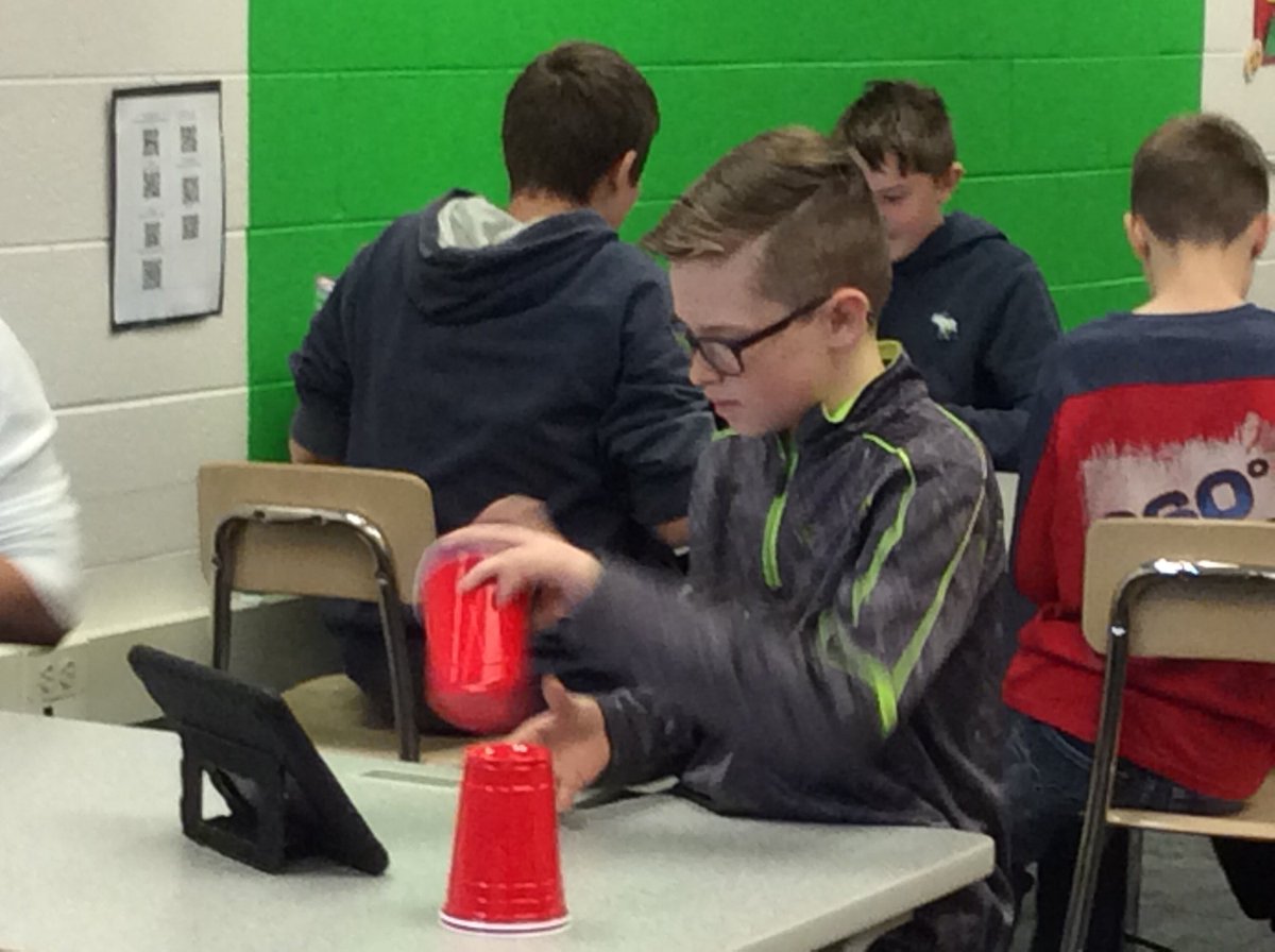 6th graders finding out more about coding and decomposition while learning The Cup Song.