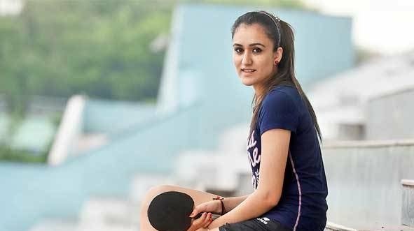 Pracha21's tweet photo. Manika batra creates HISTORY!!!
She becomes the first Indian woman to win GOLD in women's single event and also the most successful member of Indian contingent clinching four medals. Truly an inspiration...!!!! 
#ManikaBatra #GC2018
#GC2018TableTennis #CWG18 #TableTennis https://t.co/2rQo6ijSI4