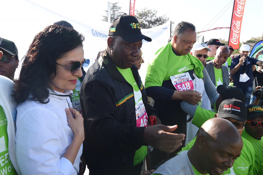 PresidencyZA's tweet photo. President Cyril Ramaphosa  participating in the 12km fun walk during the 33rd Annual Gandhi Walk in Lenasia. At the invitation of the President, Reverend Jesse Jackson joined the fun walk.

The walk is organised annually as a fundraiser by the Gandhi Walk Committee (GWC) https://t.co/UgsouVCjrj