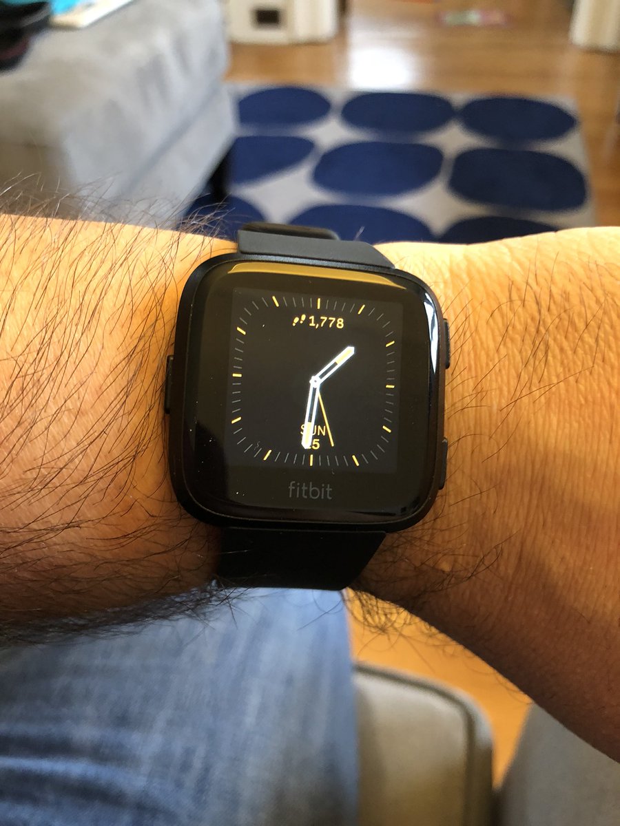 fitbit with analog watch