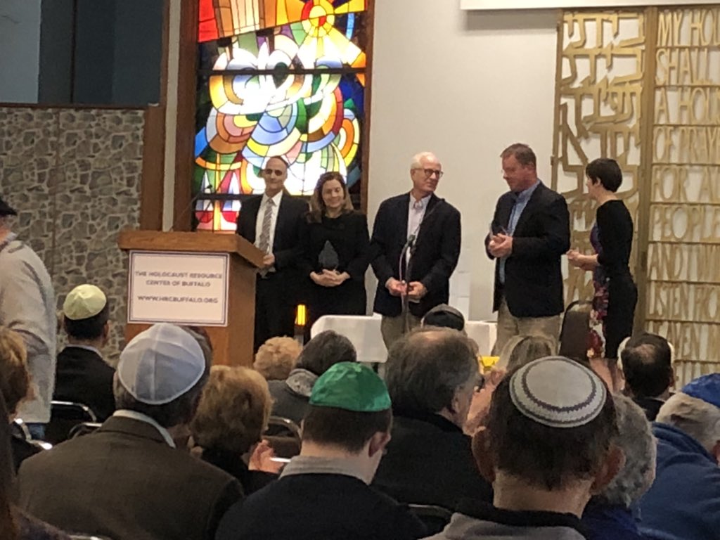 The <a href="/TheBuffaloNews/">The Buffalo News</a> team — <a href="/photocc/">Cathaleen Curtiss</a>, <a href="/MQMulville/">Mark Mulville</a>, <a href="/msommerbn/">Mark Sommer</a>, Gene Warne, Vince Chiaramonte — that produced The News’ section documenting local Holocaust survivors is recognized at the Holocaust Resource Center of Buffalo’s Holocaust Remembrance Day commemoration this morning.