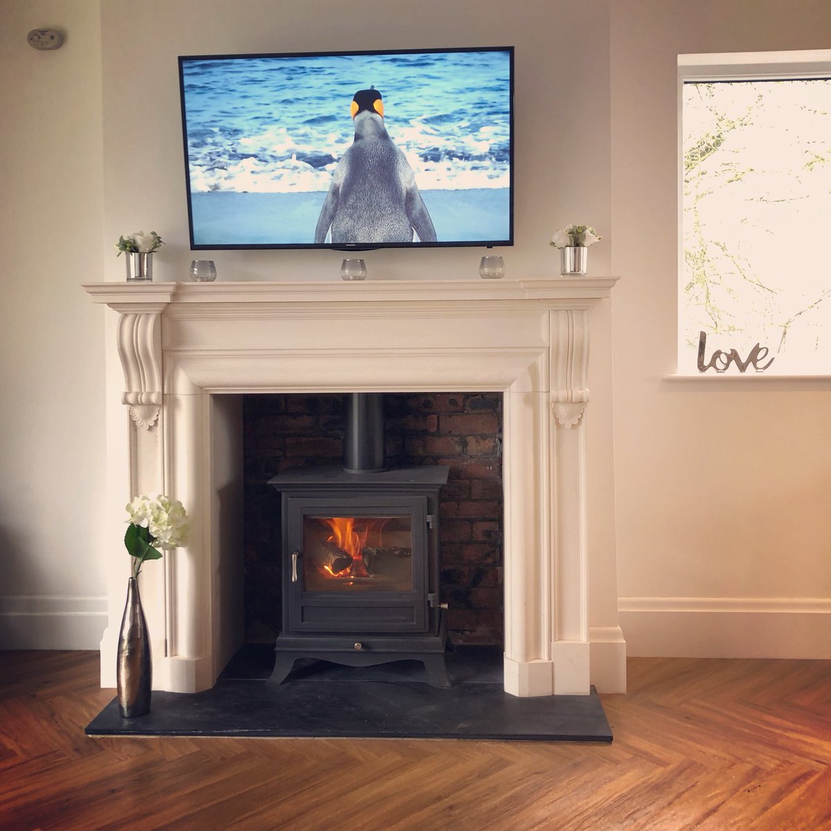 Chilled out Sundays at home. <a href="/ChesneysLtd/">Chesneys London</a> stove and surround
