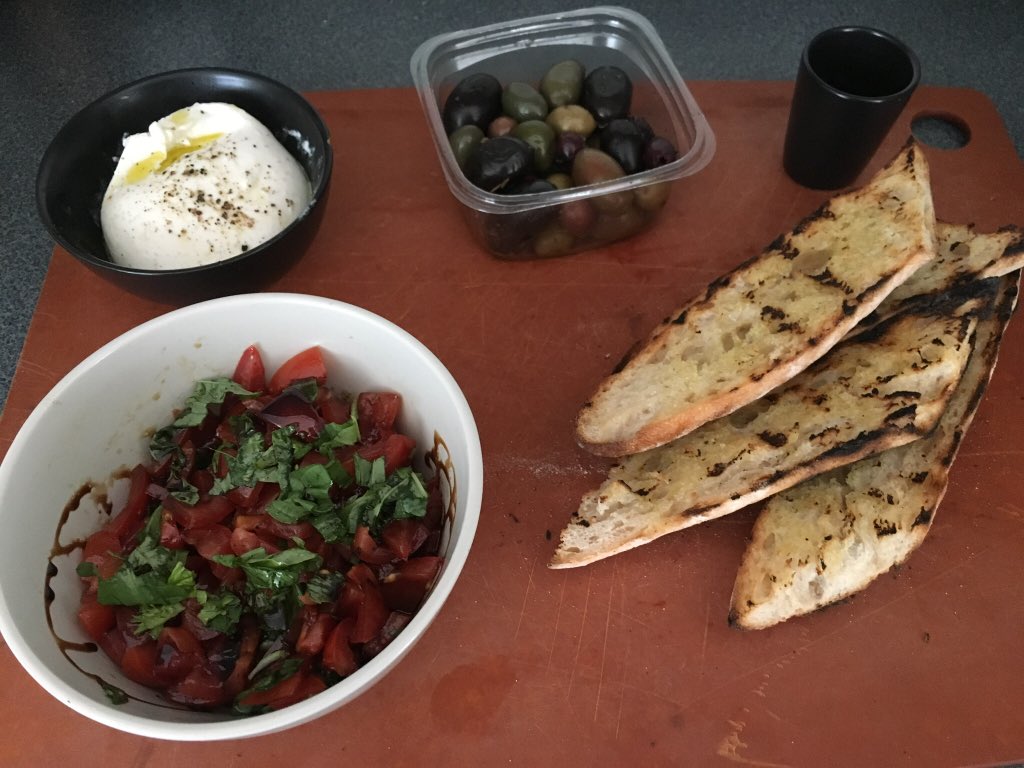 JustJilling's tweet photo. A breakfast for champions with @YourFace250. Italian burrata, Sunwing Farm tomatoes, Fol Epi baguette, and Charelli’s olives, all from @charellischeese! https://t.co/Up7QWIYOk9