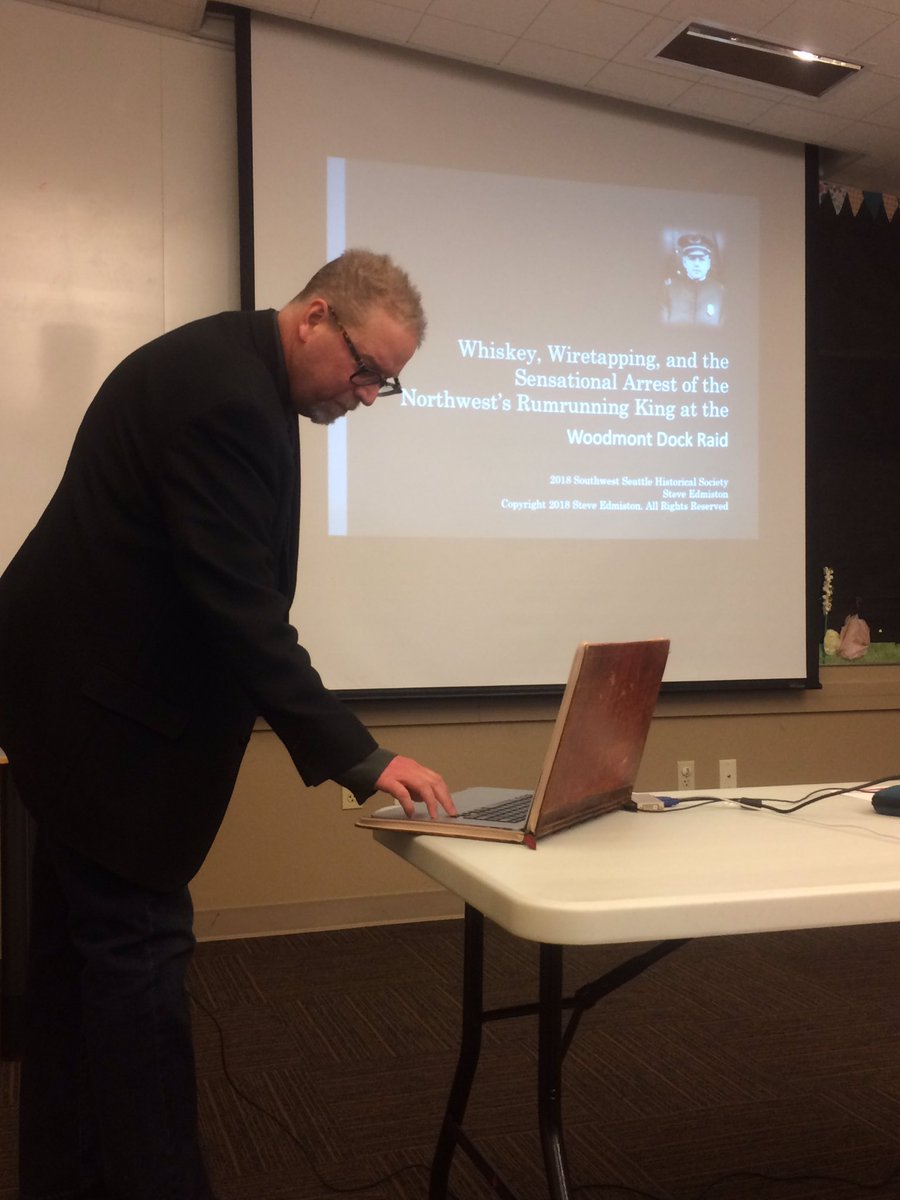 razelagustino's tweet photo. That laptop cover tho. What a fascinating, INCREDIBLE talk @SPLBuzz by @SteveEdmiston about the history of Roy Olmstead, Southwest Seattle's former #Seattle police lieutenant and absurdly rich Prohibition-era "Good Bootlegger." I love #microhistory ❤️ https://t.co/cAzQxbFX6a