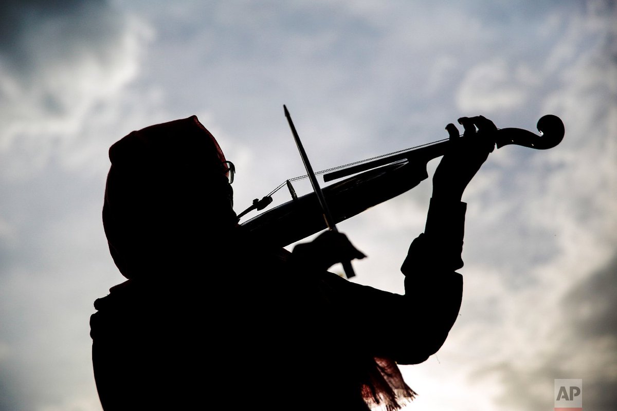 AP_Images's tweet photo. In war-torn Yemen, music lessons offer refuge https://t.co/r5kgMNvN9T | Photos @hani_mohamd https://t.co/vF8tpUGEjm