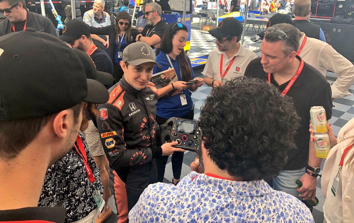 AndrettiIndy's tweet photo. Race car driver AND tour guide. @ZachVeach is showing #GroupOneThousandOne around the #TBPLB #IndyCar garages. https://t.co/lohZTOKB9y