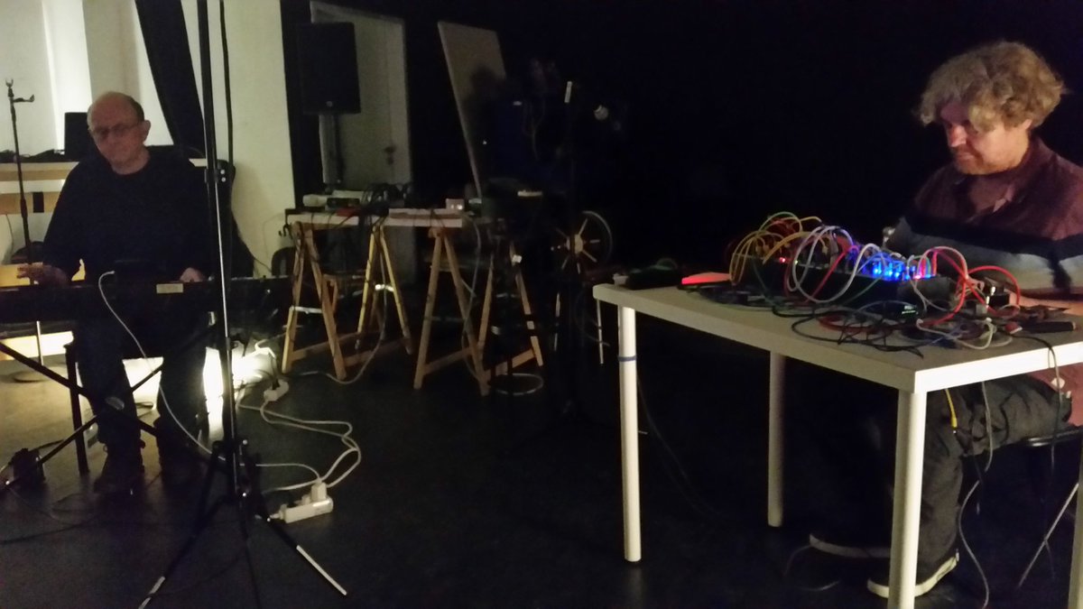 kaffematthews's tweet photo. great combo. man playing sound through machine with machine playing sound through man #chrisabrahams #phildurrant #echzeitmusik https://t.co/C3yUHZ9PqE