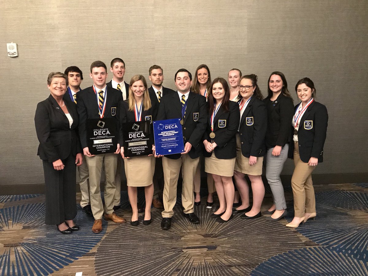 umd_deca's tweet photo. We are happy to announce that UMass Dartmouth DECA received the Cluster Award for the most points scored in the Business Administration category at #CDECAICDC! We are SO proud of our members - check out all of those medals! https://t.co/BGvM8rKgC5