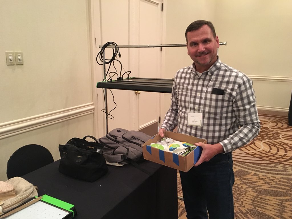 BIOSLIGHTINGLED's tweet photo. As committee secretary, Neil discusses last minute arrangements for #NCERA 101 and gets busy setting up the #bioslighting booth with Rebecca. What #photobiology topics do you want to know more about? #ncstate #indoorfarming #verticalfarming https://t.co/GKV6AaUTCm