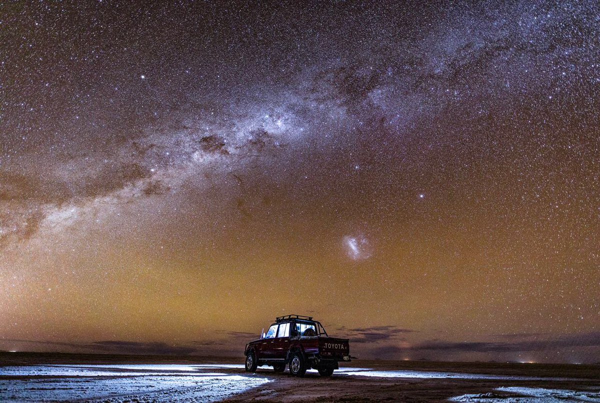 cnni's tweet photo. A starry night is captured over Salar de Uyuni -- the world’s largest salt flat. Many choose 4x4s to make adventurous journeys through one of the most unique landscapes in the world. (📸: @cpdalex/instagram) https://t.co/3iTBBOmJIw https://t.co/98w4EqLRau