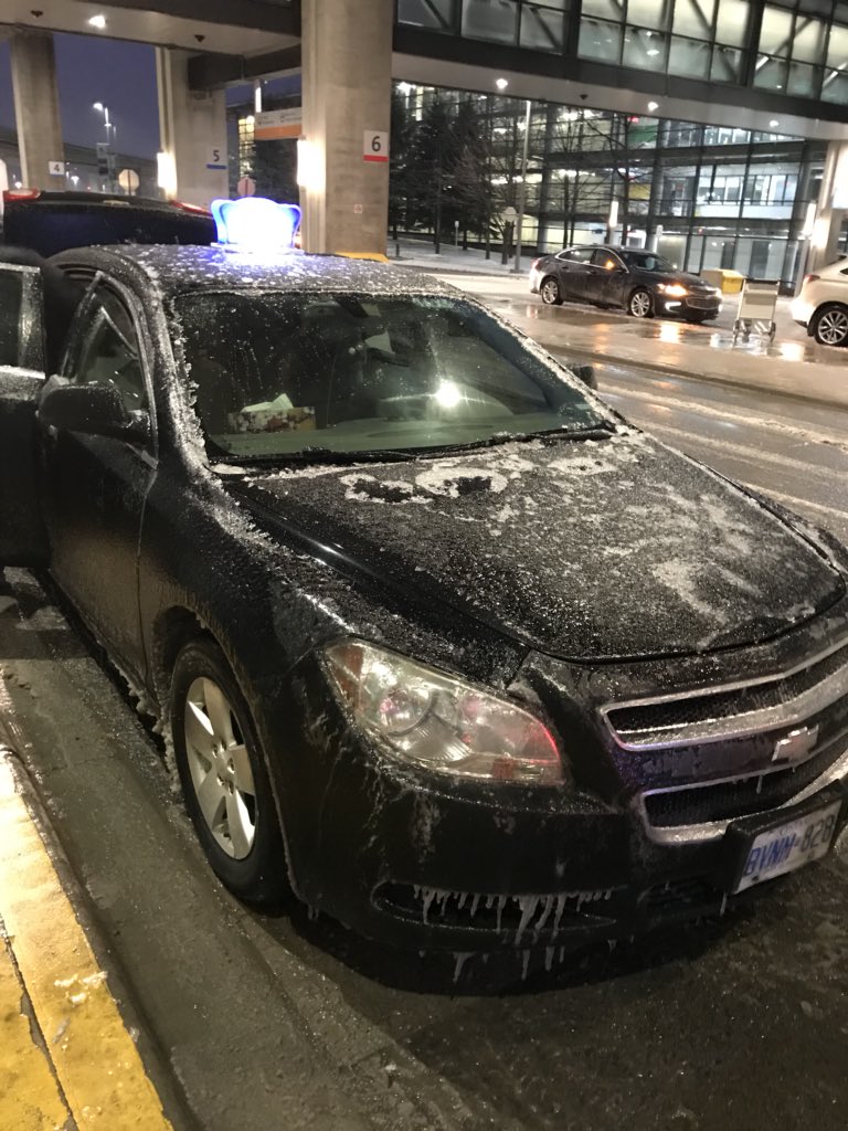 ToddDohertyMP's tweet photo. Taxis are covered in a sheath of ice.. #ottawa #springstorm #sundaycommute https://t.co/mHbsC6KP7W