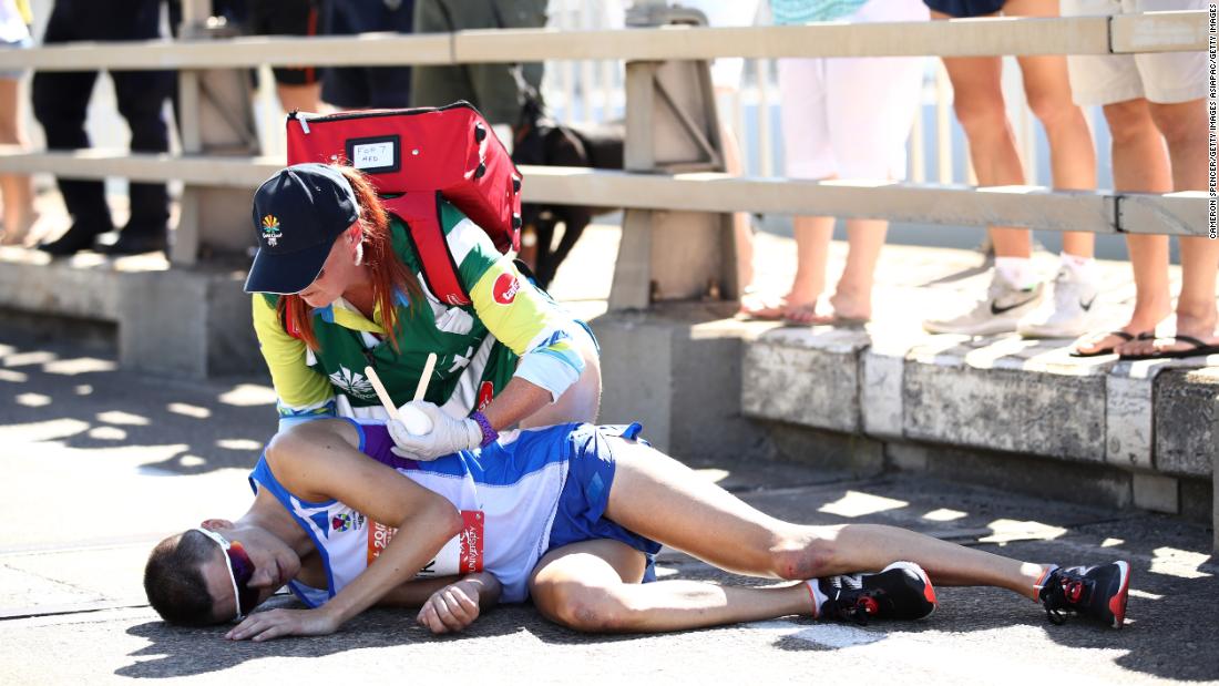 CNN's tweet photo. Marathon runner misses out on gold after collapsing 2 km from finishing line https://t.co/TjGpW4lRbO https://t.co/rb6L84nD7J