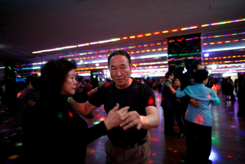 Reuters's tweet photo. In daytime discos, South Korea's elderly find escape from anxiety https://t.co/QYWVIsfNsk https://t.co/w2ctUHfzrl