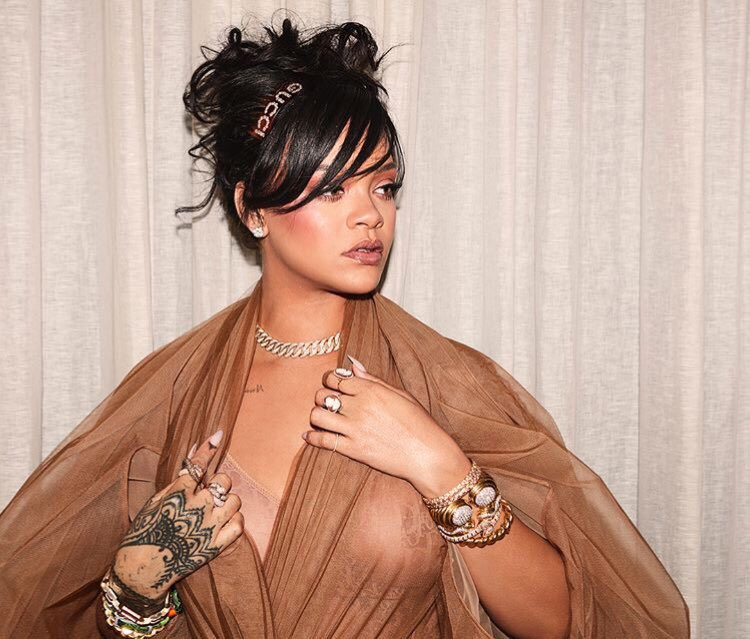PopCrave's tweet photo. Rihanna stuns in see-through outfit and thigh-high boots at #Coachella. https://t.co/SdOUpSqHIV