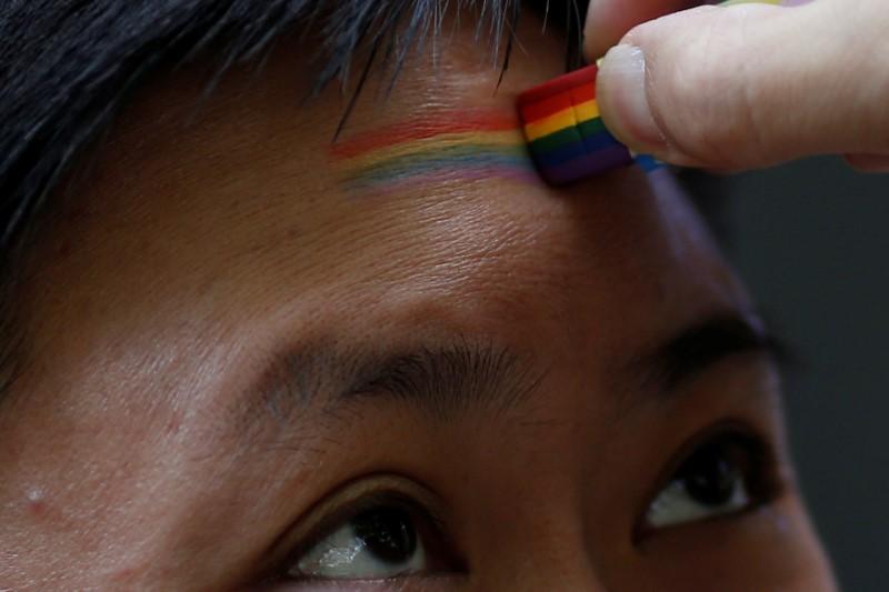 Reuters's tweet photo. China's Sina Weibo reverses gay content clean-up after outcry https://t.co/vhqLivBk2E https://t.co/fzlOCsYq9T