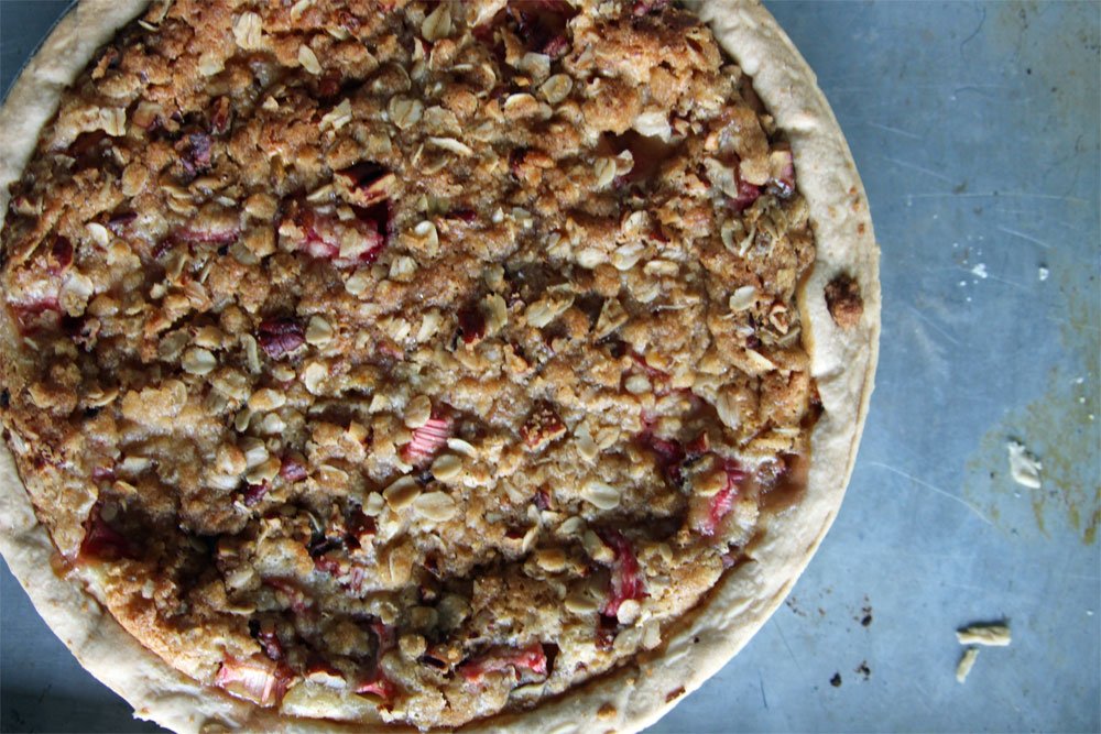 We can't get enough of this custardy sour cream rhubarb pie topped with oat streusel. Recipe from <a href="/sheri/">shahrzad</a>.castle's Rhubarb cookbook!