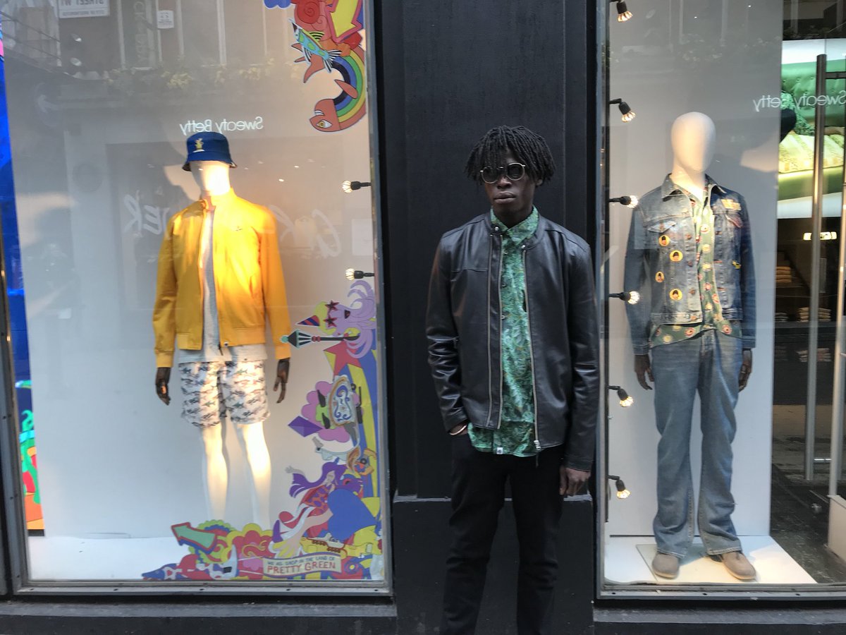 PG_Carnaby's tweet photo. #tb to our Pretty Green X @katieeary collection! Ianik is wearing the Toria Print Shirt, the Biker Leather Jacket and our round framed sunglasses! Come visit us in our Carnaby store to get a couple of summer essentials now that spring has arrived https://t.co/G7xC8QLC1r
