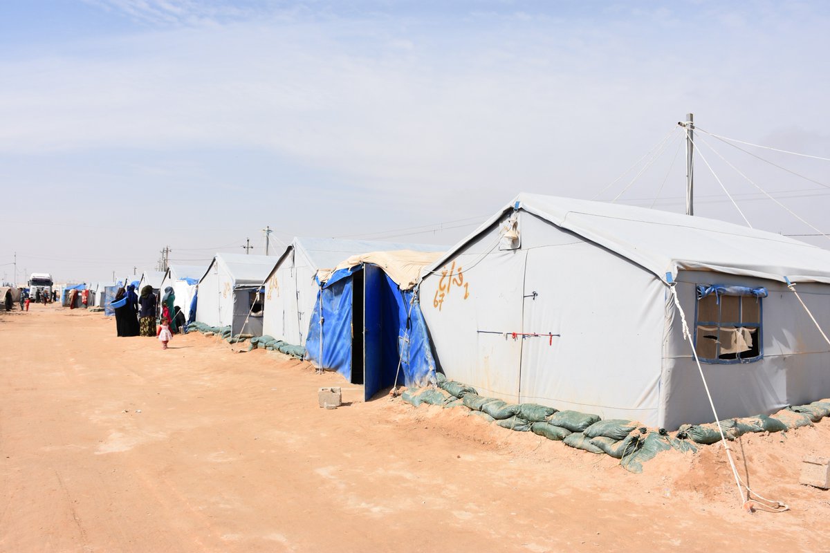 IOMIraq's tweet photo. “Because of constant shelling, we displaced from our home in Karabla sub-district to Camp Kilo18 in #AlAnbar looking for safety. The sandbags placed around our tent and in the camp help to minimize the risk of #flooding,” said Saif, 18 years old. https://t.co/fqWekk87Lw