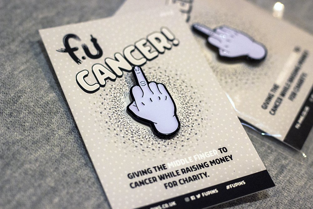 acampion's tweet photo. I've come up with another project raising money for charities while sticking my middle finger up to cancer. Introducing @FuPins, https://t.co/vQwQ1S6KvT #charity #fucancer #fupins https://t.co/YvWzTKbafy