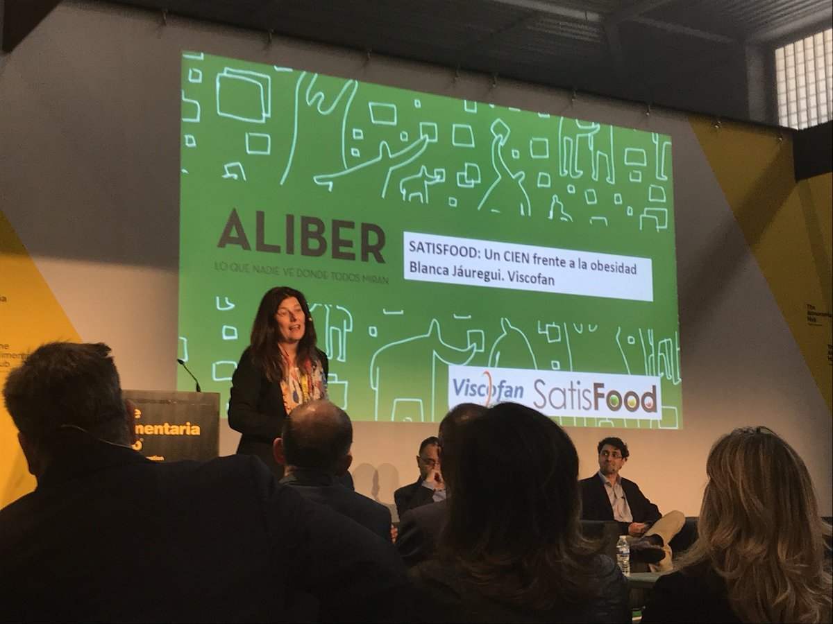 Food4LifeSPAIN's tweet photo. “#SATISFOOD: un CIEN frente a la #obesidad” por Blanca Jauregui, Directora Adjunta de I+D de #VISCOFAN // ¡Escuchamos atent@s cómo desarrollan sus proyectos y líneas de #innovación e investigación! #Aliber18 #Aliber2018 #Alimentaria2018 https://t.co/x4L54Oqw5m