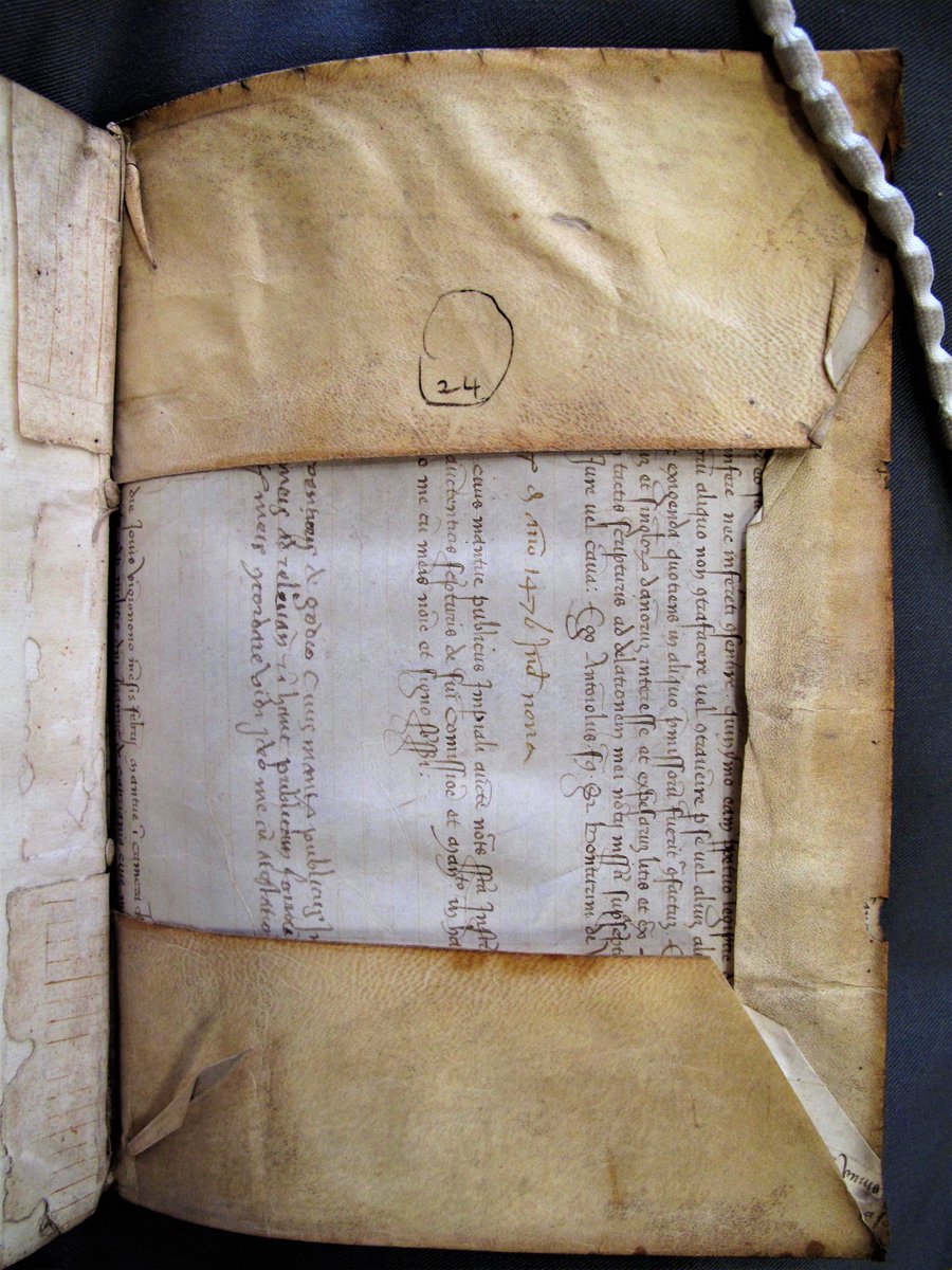 MarshsLibrary's tweet photo. It really makes your day when you open a book from 1561 and find that the binding is an old manuscript from 1476 that has been reused. Very common to find old waste in bindings but you don't always get a whole document! #manuscriptwaste #bindingwaste https://t.co/4pNDmDO3Px