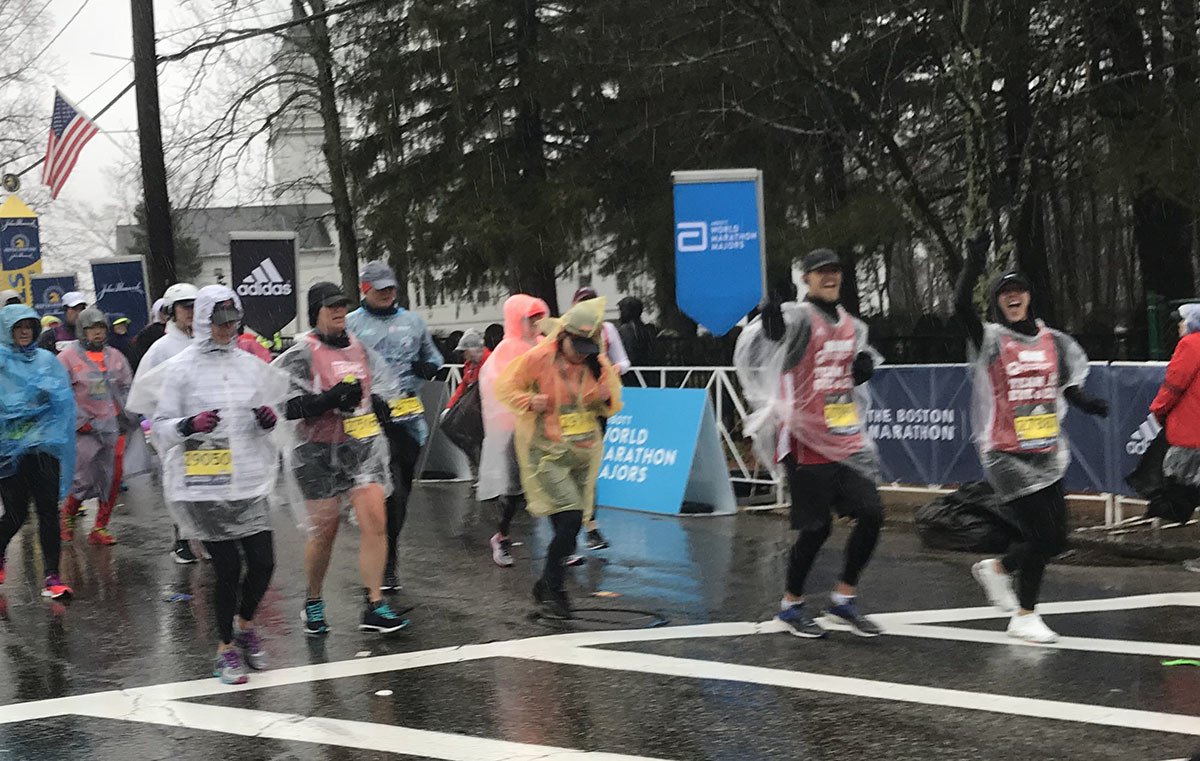 Two members of <a href="/TeamEyeAndEar/">Team Eye and Ear</a> (at right) cross the #BostonMarathon starting line! #TogetherForward